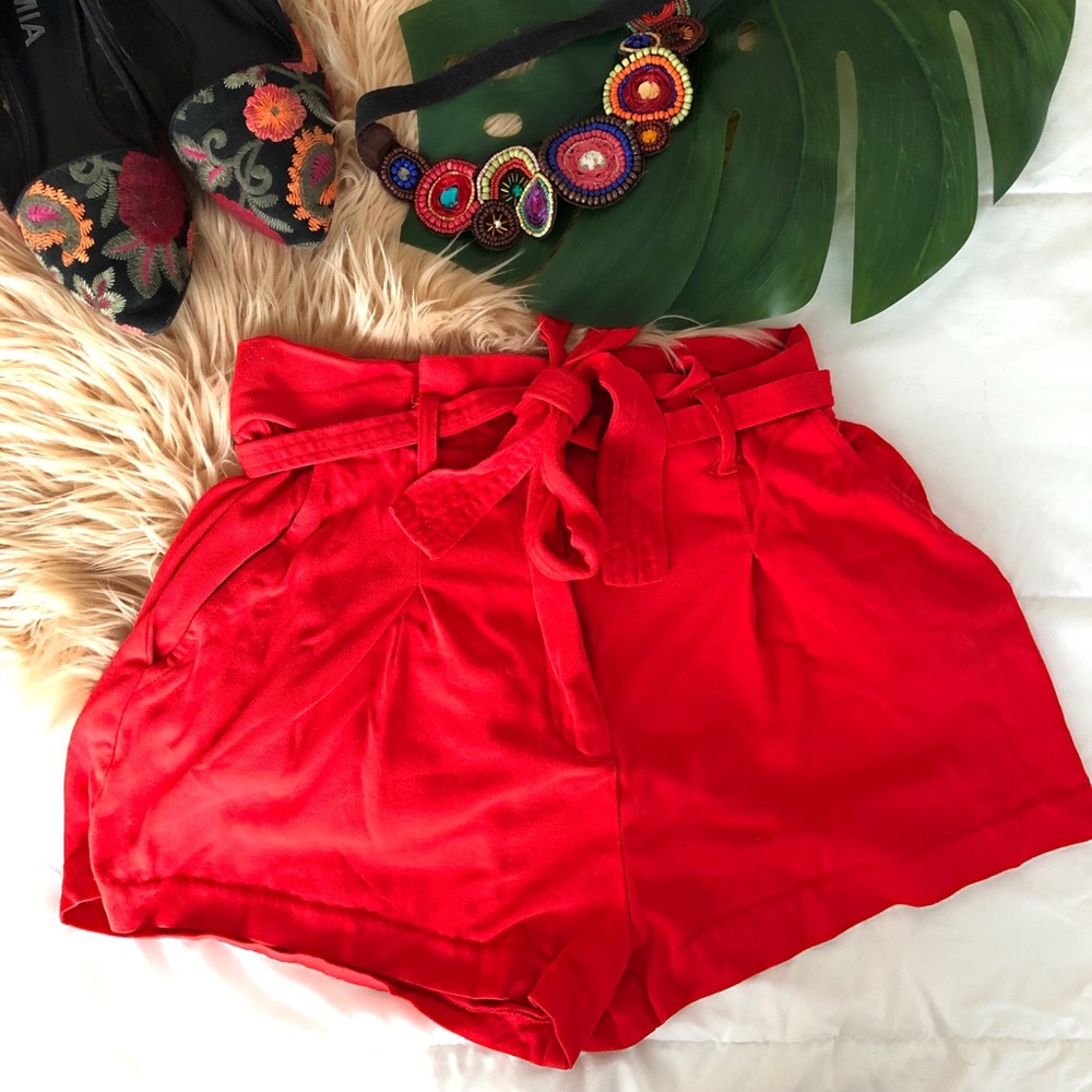 Red belted paper bag shorts